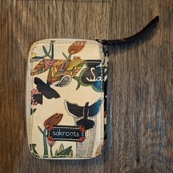 The Sakroots Peace Crossbody Wallet. - Picture 4 of 15